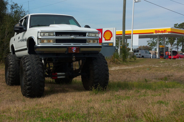 White truck with big tires