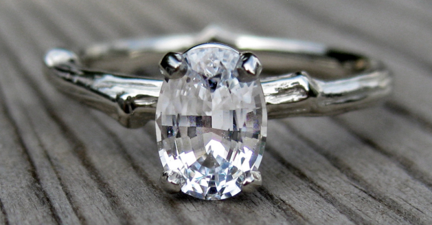 White sapphire engagement ring in white gold