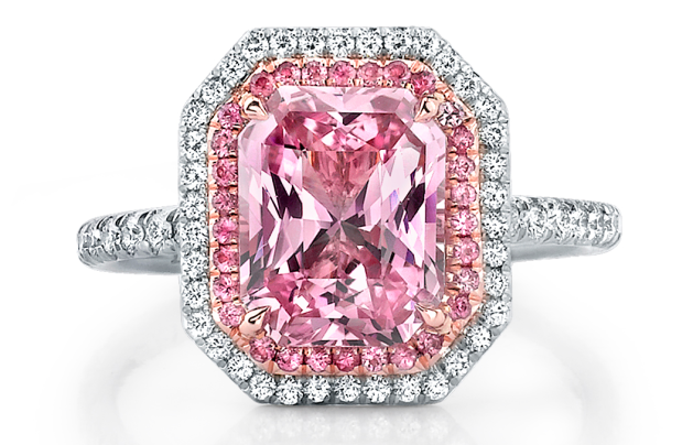 Pink sapphire and diamond engagement ring in white gold