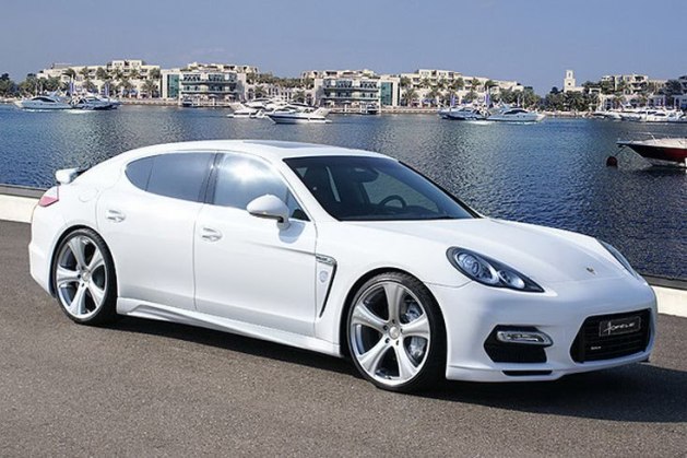 White Porsche Panamera by the water