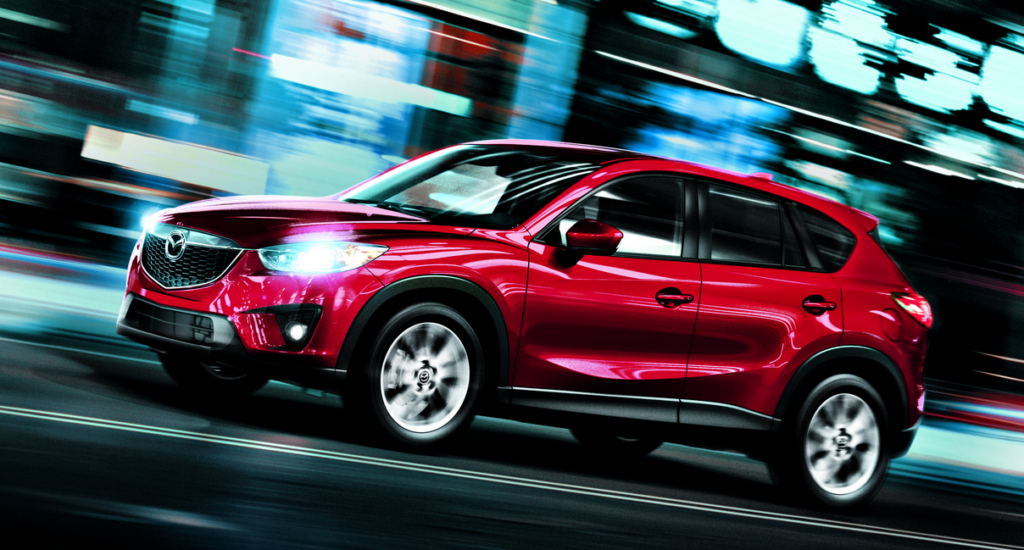 red mazda cx-5 on road