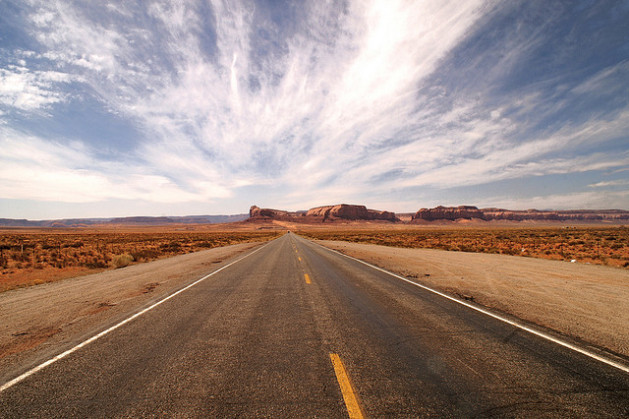 open desert road on road trip