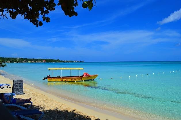 seven mile beach in Jamaica blue water white sand beach