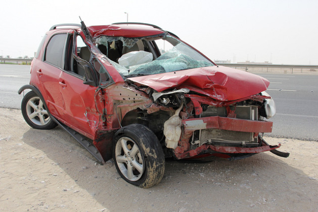 Red Suzuki front end wrecked