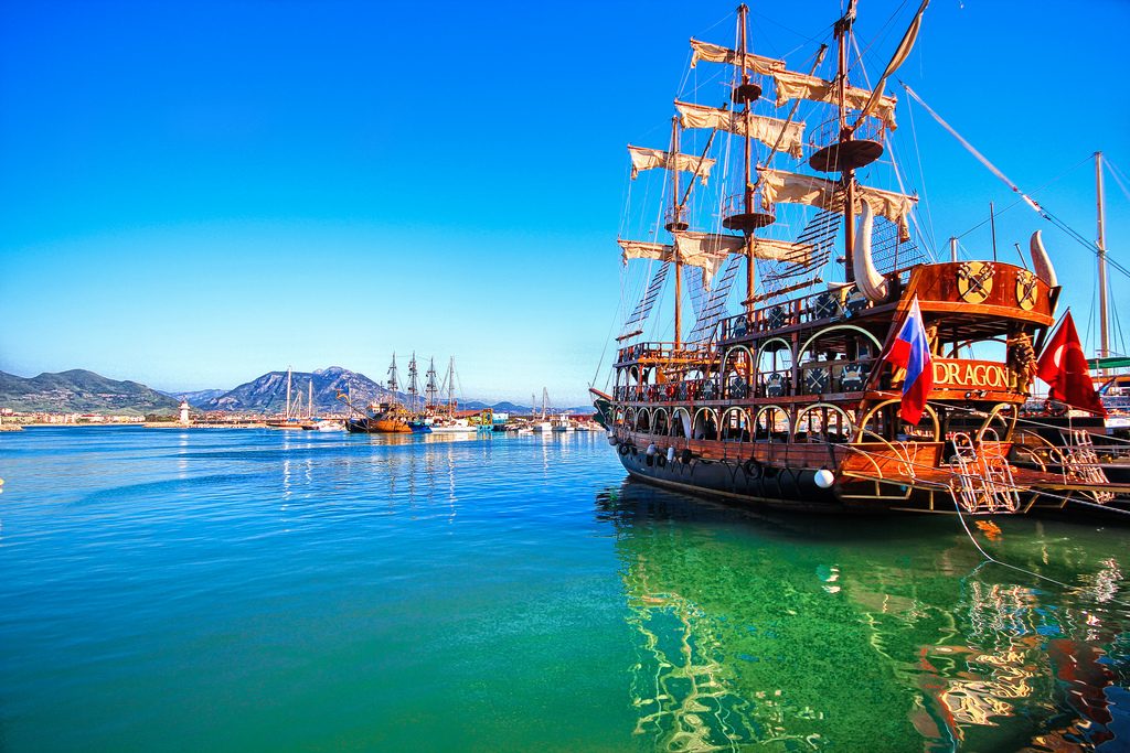 Pirate ship on bright blue and green water