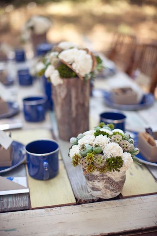 rustic wood wedding table with blue mugs