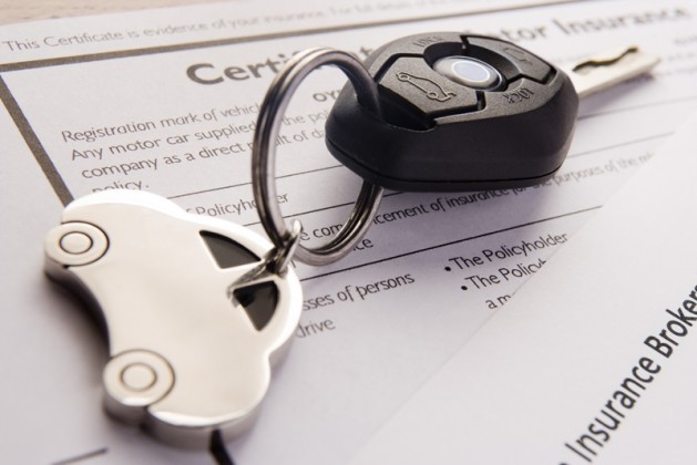 Car Keys On Insurance Documents