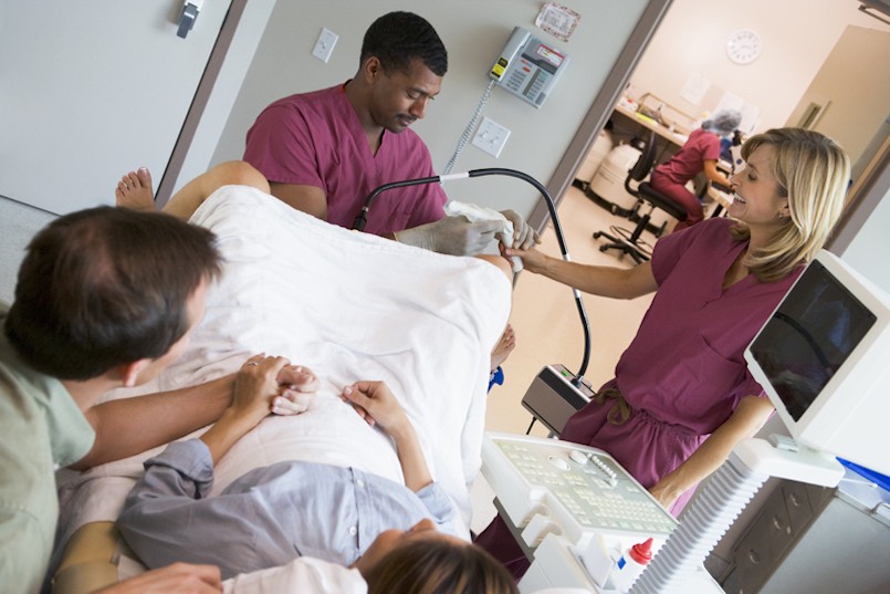 Doctor retrieving eggs from ovary using vaginal ultrasound