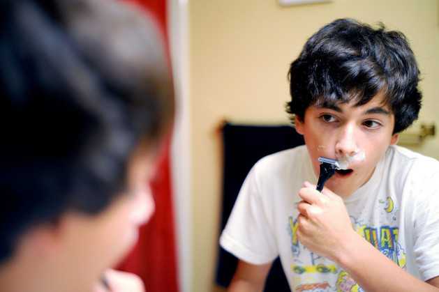 boy shaving for the first time