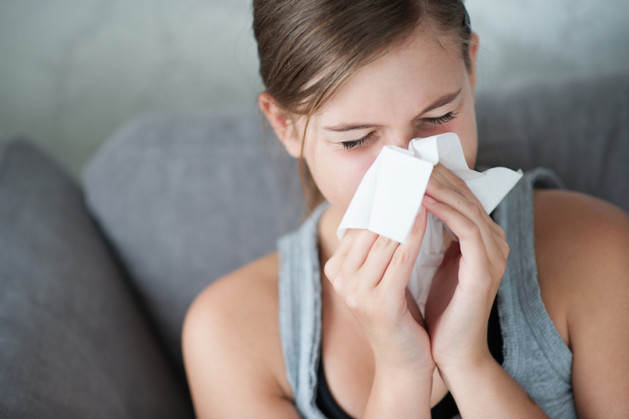 Child cold flu illness tissue blowing runny nose