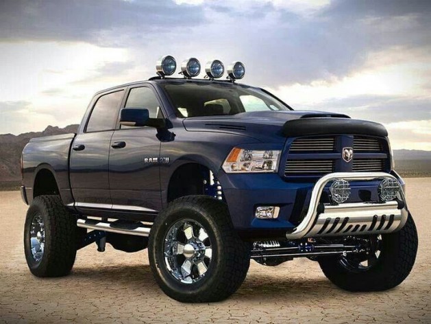 blue pickup truck with lights and chrome work