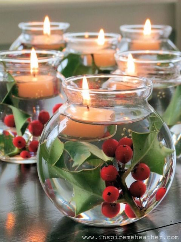 floating candles in class votive with holly berries