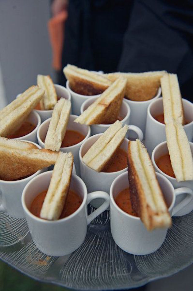 grilled cheese with hot tomato soup in white coffee mug for wedding