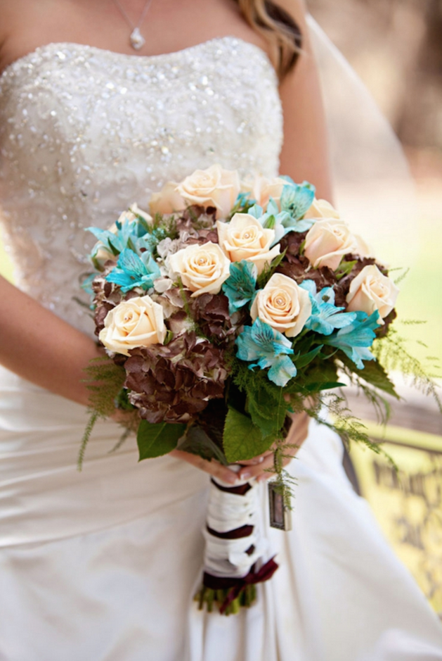 wedding bouquet with chocolate hydrangea roses and blue lilies