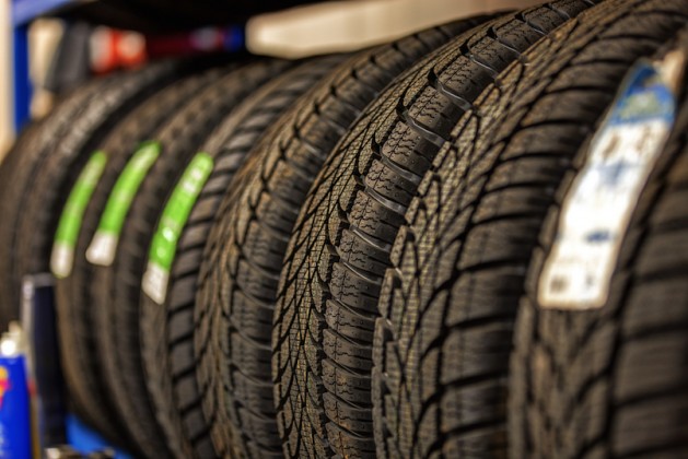 Car tires at warehouse in tire store