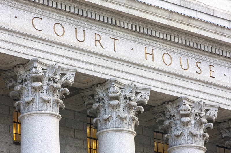 Courthouse facade with columns.