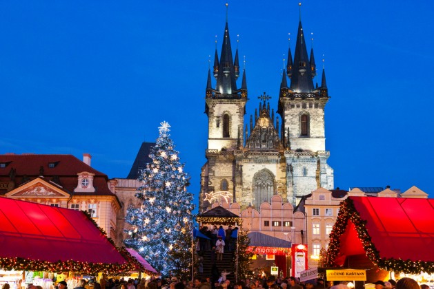 PRAGUE,CZECH REPUBLIC-JAN 05, 2013: Prague Christmas market on Old Town Square with gothic Tyne cathedral