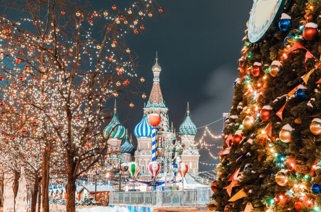 Decorations for New Year and holidays. Christmas balls on tree branches near to St. Basil's Cathedral on Red square in Moscow